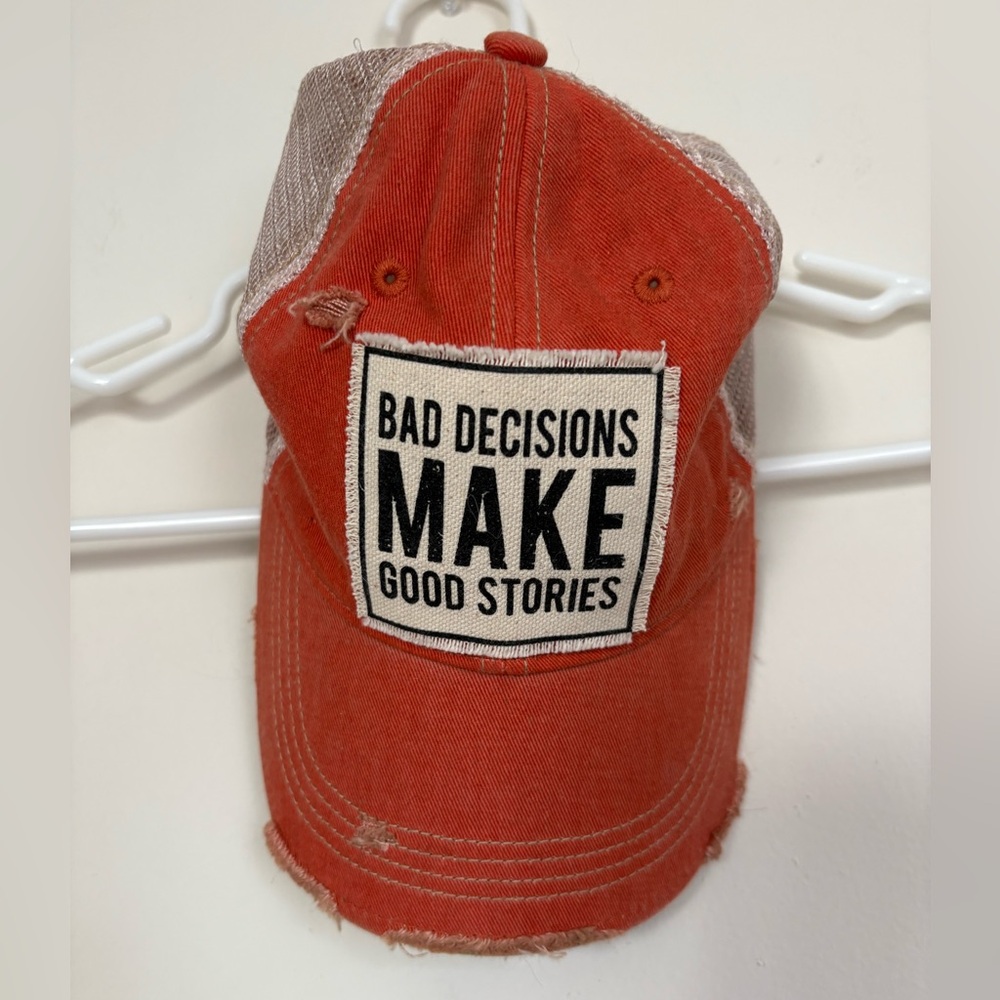 Orange Distressed Trucker Hat with 'Bad Decisions Make Good Stories' Patch